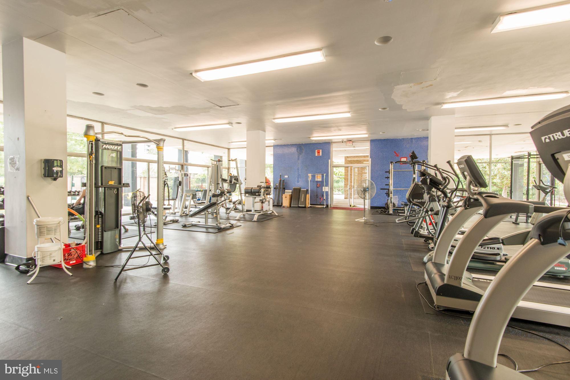 1311 Delaware Avenue Southwest, Unit S346 Washington, DC 20024 - Photo 22 of 27 a view of a room with gym equipment