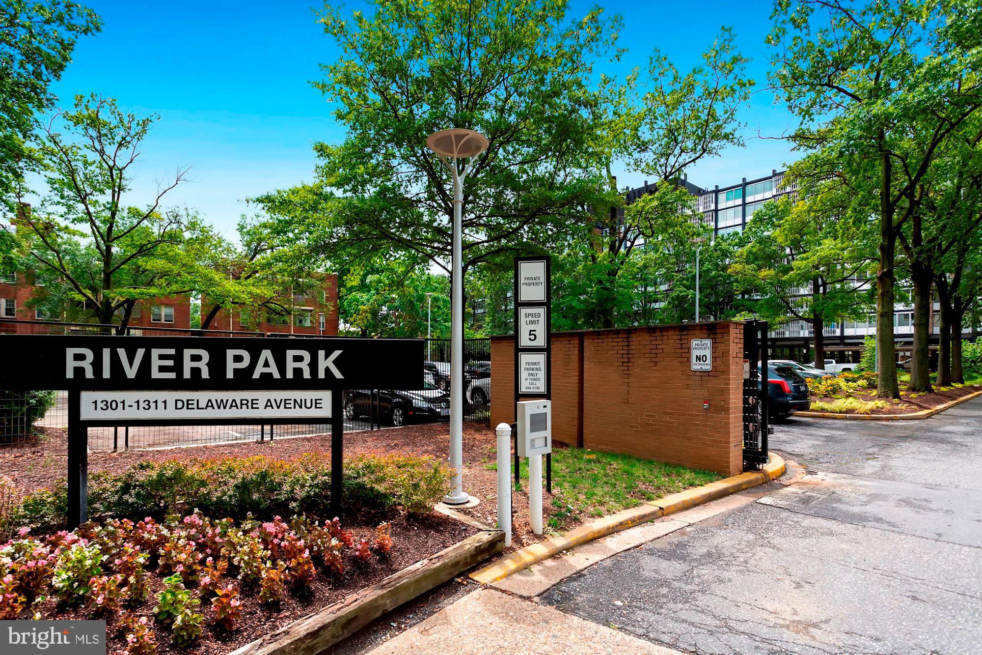 1311 Delaware Avenue Southwest, Unit S346 Washington, DC 20024 - Photo 26 of 27 a view of a street with of a wooden fence