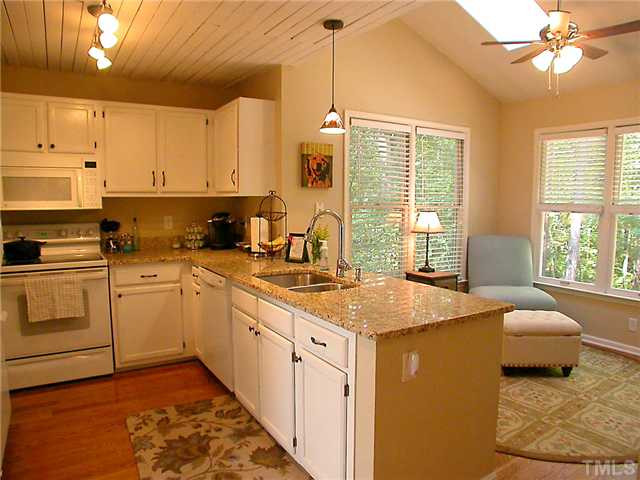 23 Thorne Ridge Drive Durham, NC 27713 - Photo 3 of 25 Granite countertops enhance this lovely kitchen. Kitchen
