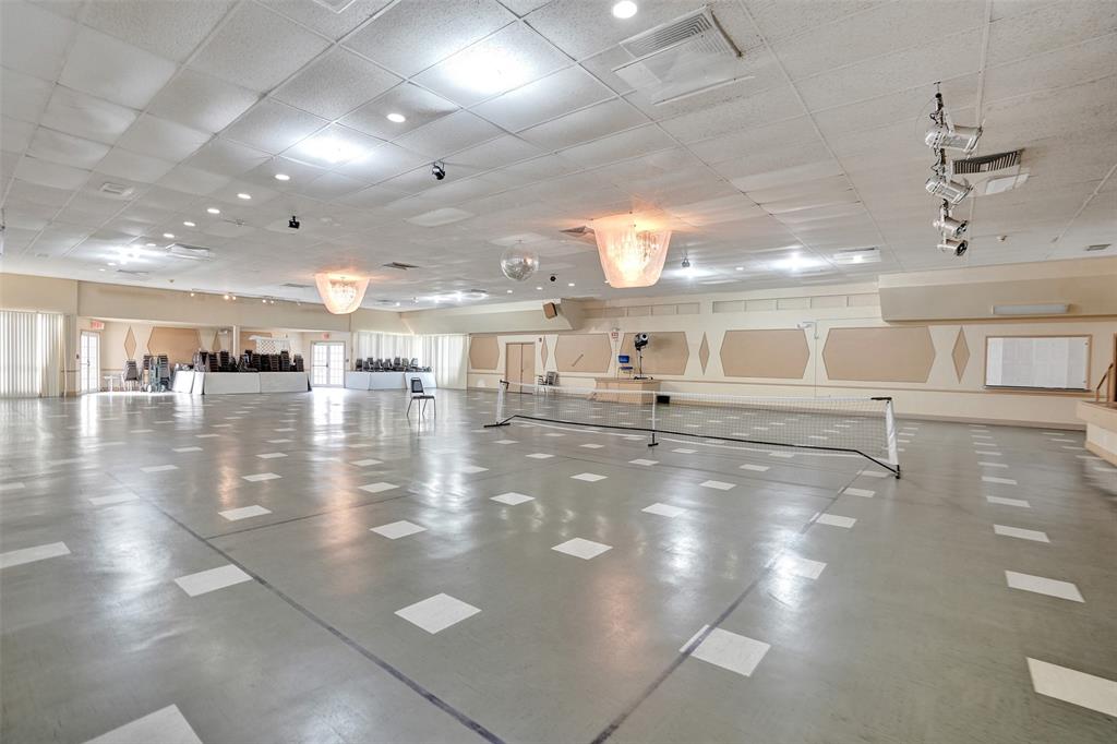 17001 Northeast 13th Avenue, Unit 104 Miami, FL 33162 - Photo 36 of 41 a view of a lobby with black carpet