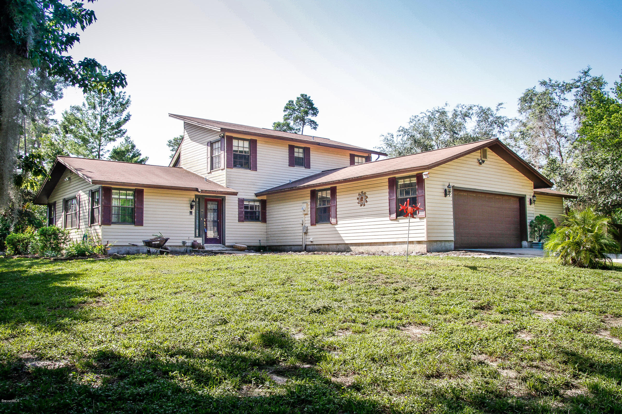 410 South Carpenter Road Titusville, FL 32796 - Photo 1 of 27 Front of Home