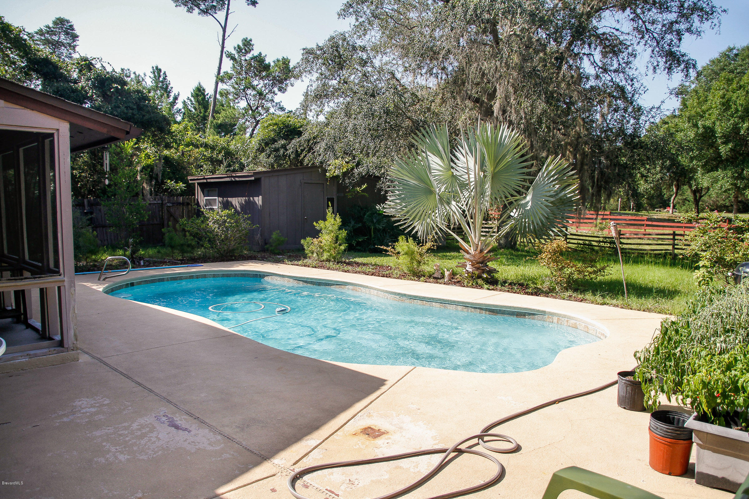 410 South Carpenter Road Titusville, FL 32796 - Photo 5 of 27 Back Yard