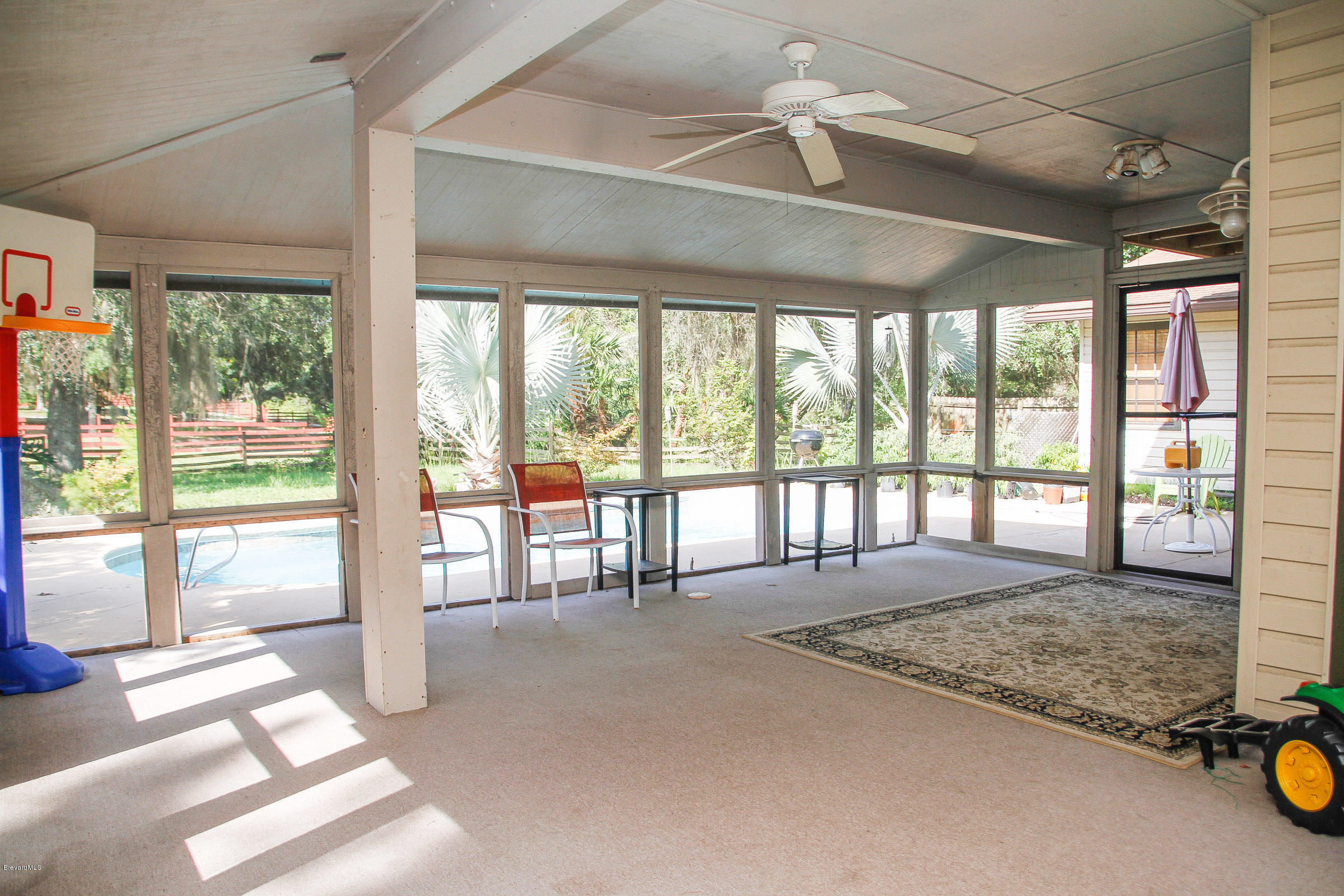410 South Carpenter Road Titusville, FL 32796 - Photo 6 of 27 Screened Patio