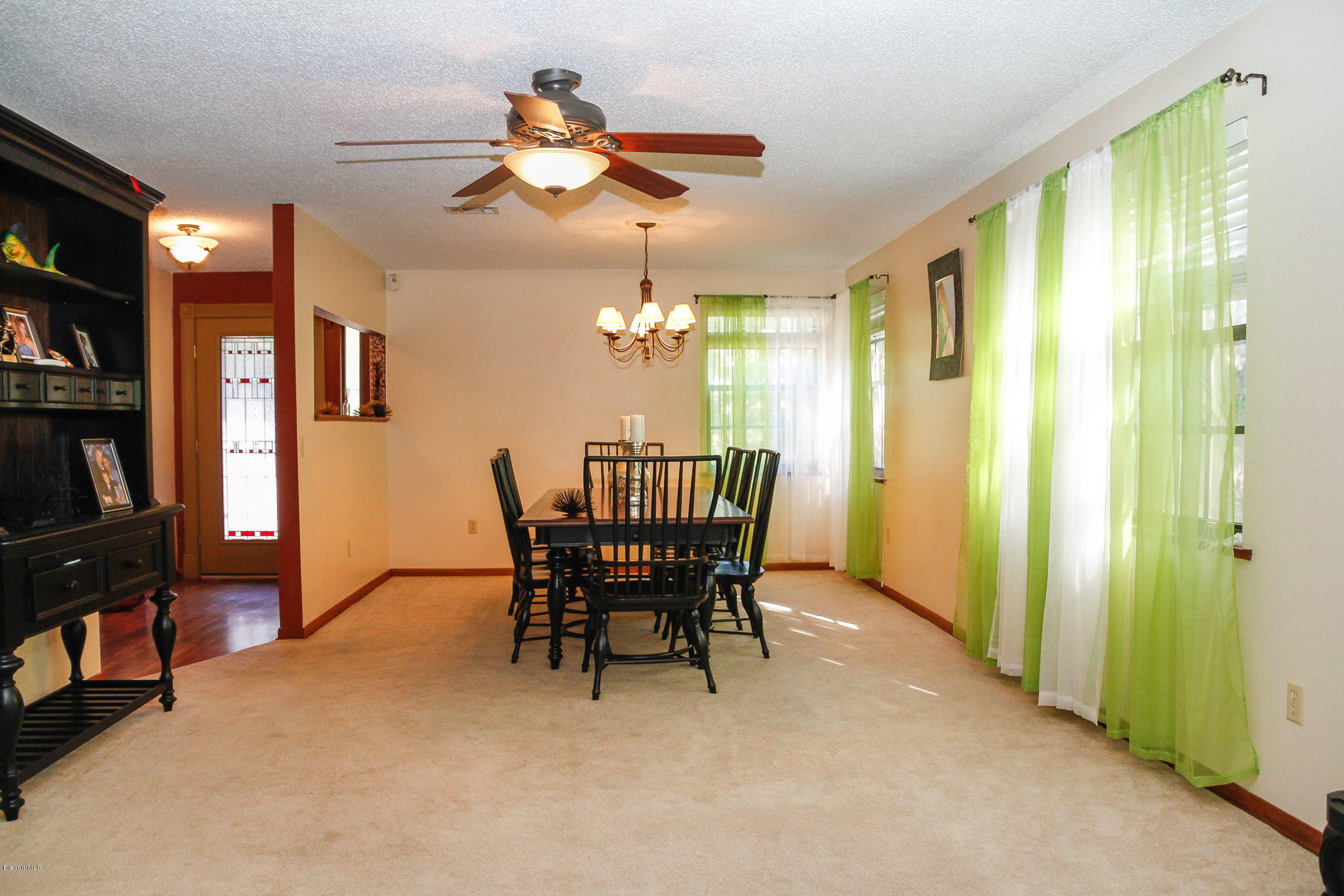 410 South Carpenter Road Titusville, FL 32796 - Photo 8 of 27 Dining Room/Living Room