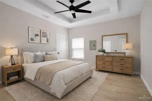 a bedroom with a bed and a dresser