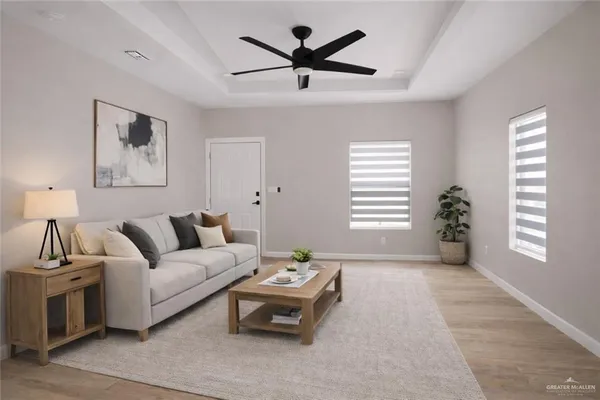 a living room with furniture and a window