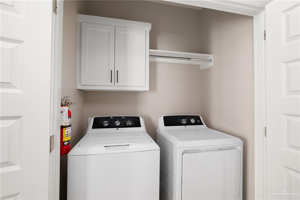 5812 Northwestern Avenue, Unit 3 Mission, TX 78573 - Photo 10 of 10 a view of storage and utility room with washer and dryer
