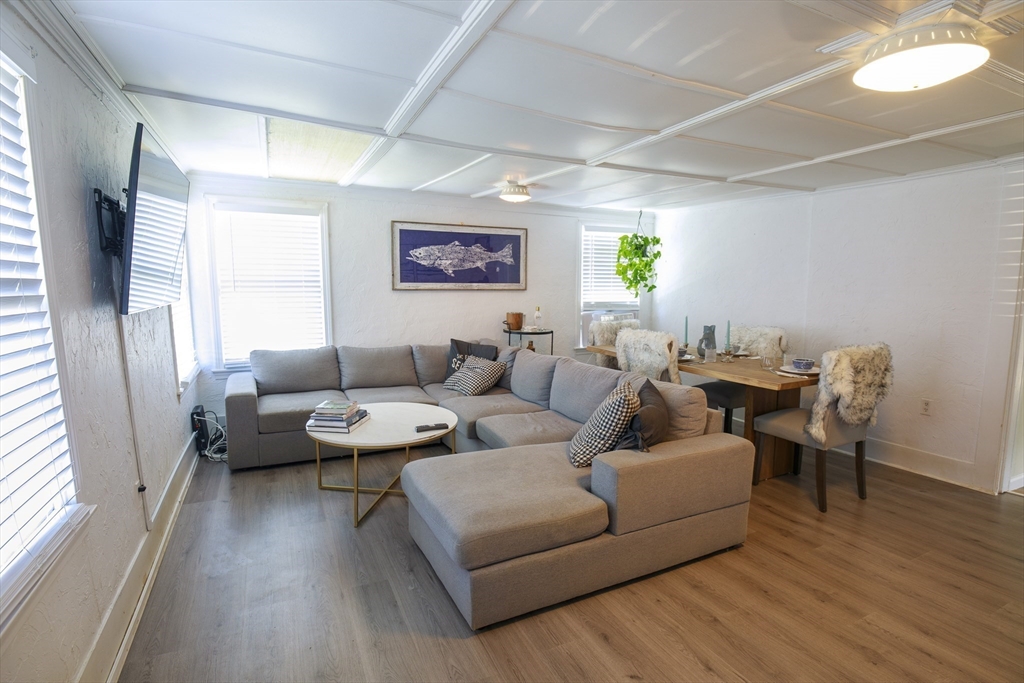 70 Cottage Road Newbury, MA 01951 - Photo 18 of 25 a living room with furniture and a flat screen tv