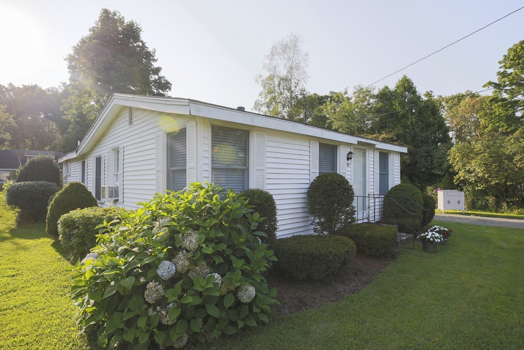70 Cottage Road Newbury, MA 01951 - Photo 2 of 25 a view of a house with backyard and sitting area