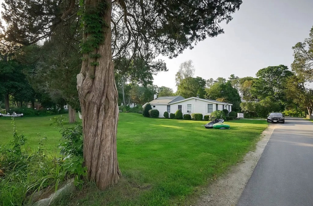 70 Cottage Road Newbury, MA 01951 - Photo 9 of 25 a front view of a house with garden