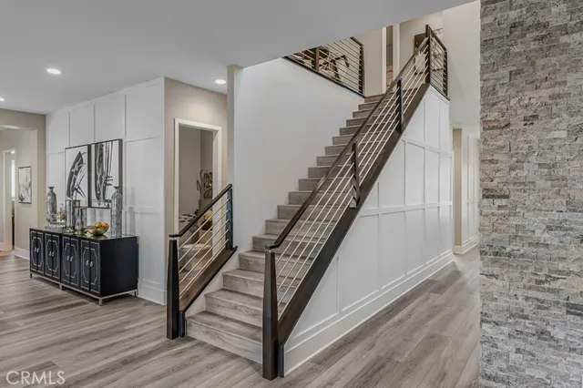 a view of entryway with wooden floor