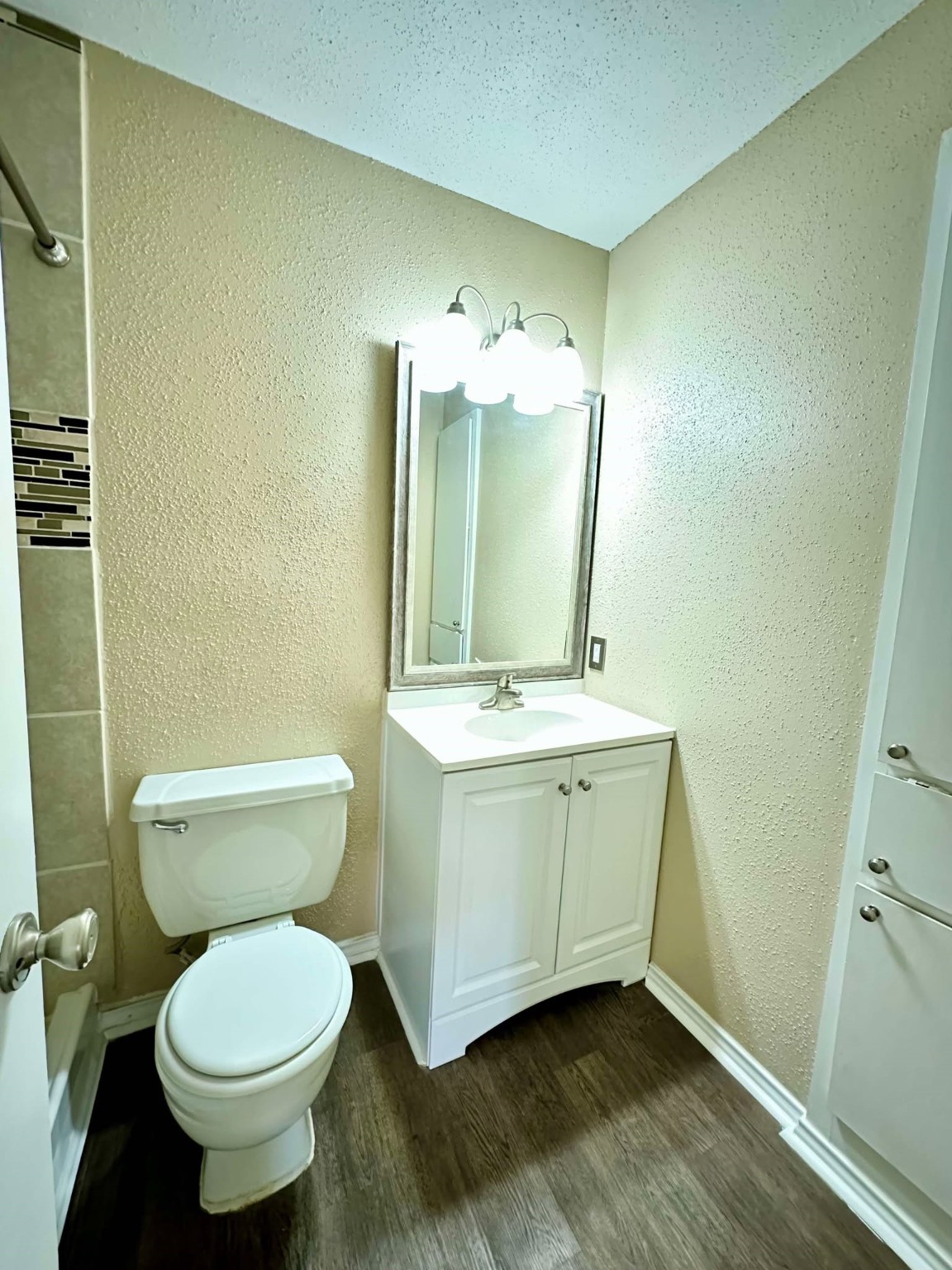 3630 Ocee Street Houston, TX 77063 - Photo 12 of 21 a bathroom with a toilet sink and mirror