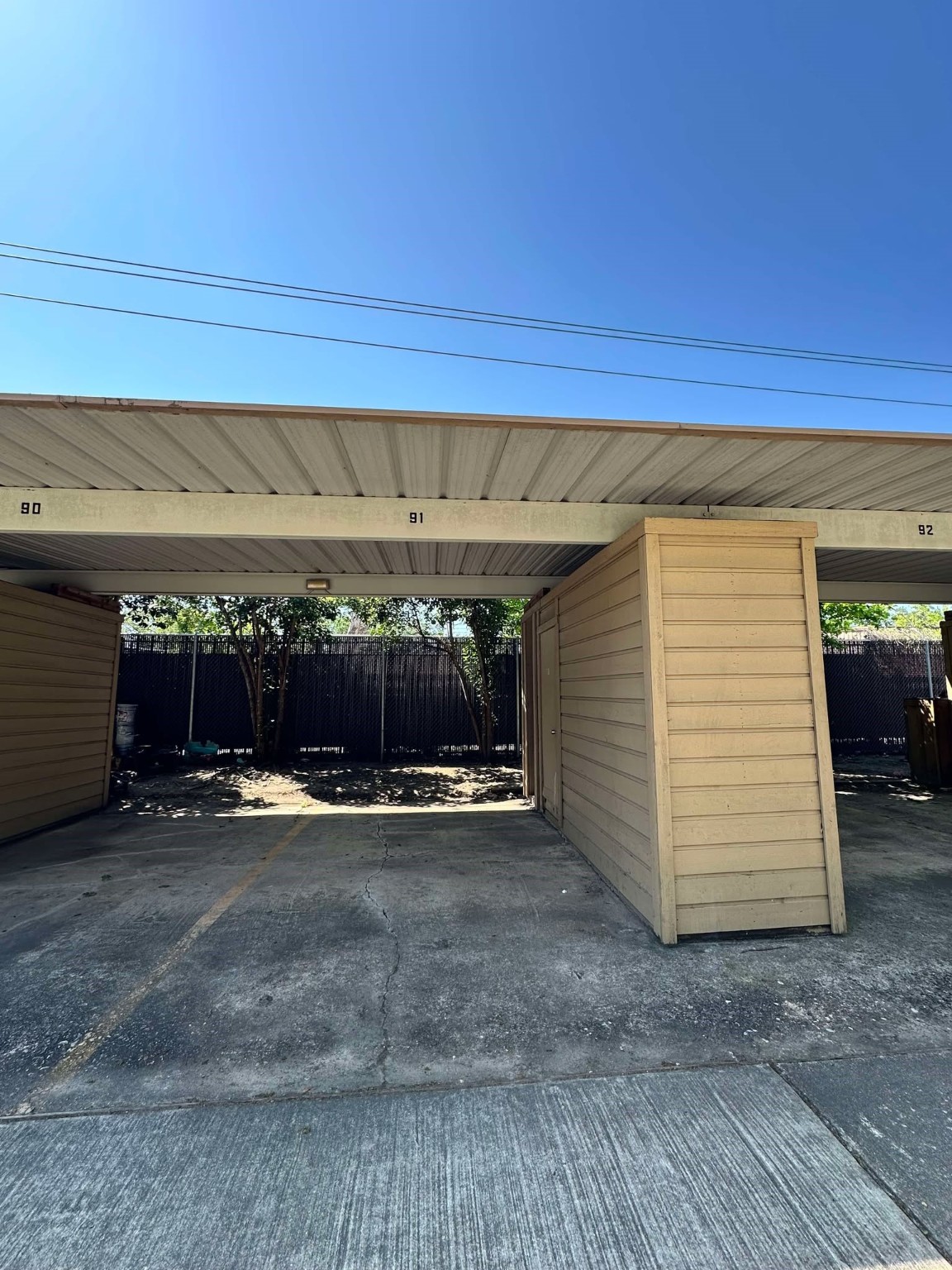 3630 Ocee Street Houston, TX 77063 - Photo 16 of 21 a view of a parking area with a car
