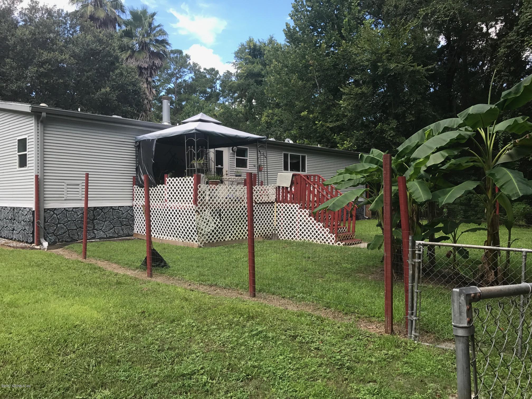 3581 Stratton Road Jacksonville, FL 32221 - Photo 4 of 14 a view of a house with backyard