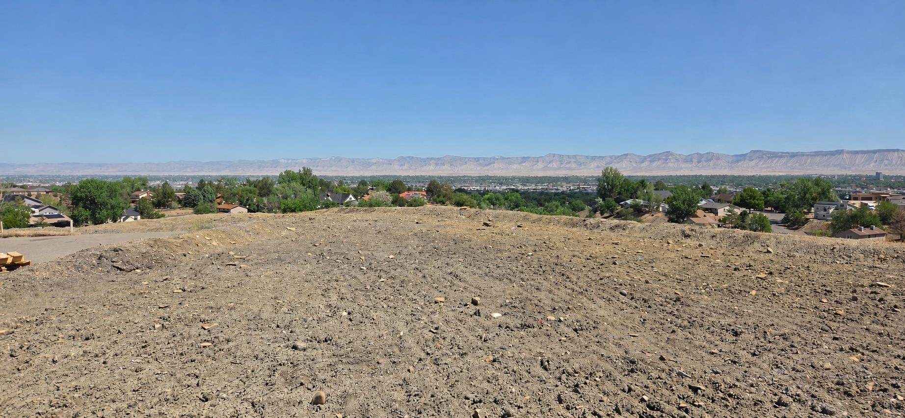 2410 Talus Lane Grand Junction, CO 81507 - Photo 10 of 10 a view of a road with a building in the background