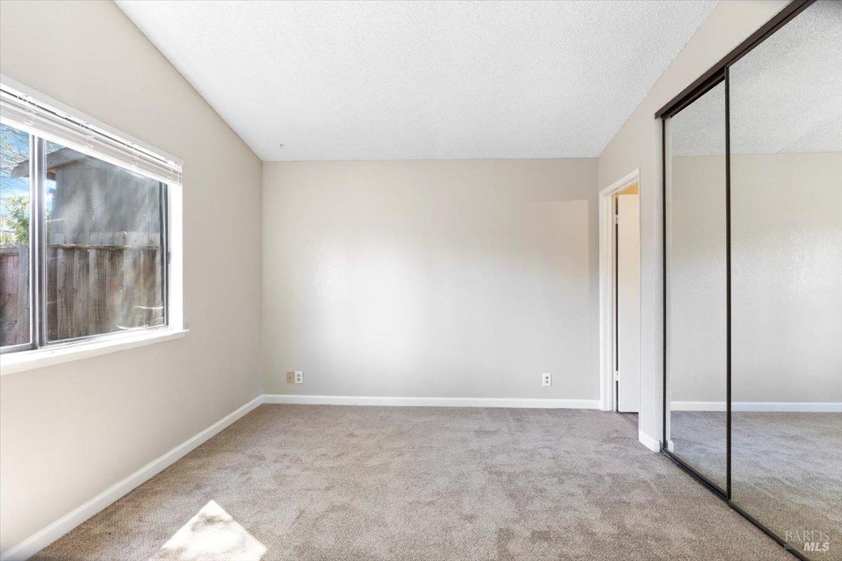 987 Daniel Street Fairfield, CA 94533 - Photo 16 of 36 a view of an empty room with a window