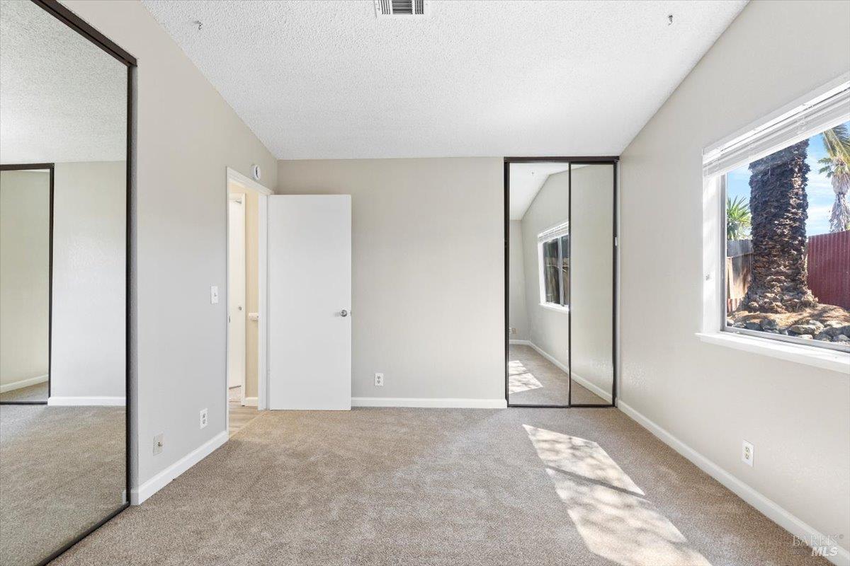 987 Daniel Street Fairfield, CA 94533 - Photo 17 of 36 a view of an empty room with a window