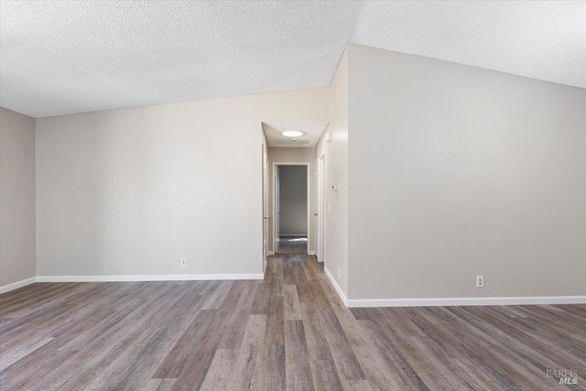987 Daniel Street Fairfield, CA 94533 - Photo 5 of 36 a view of a room with wooden floor