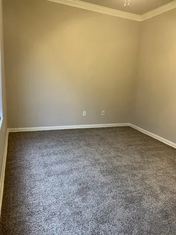 a view of a room with an empty space