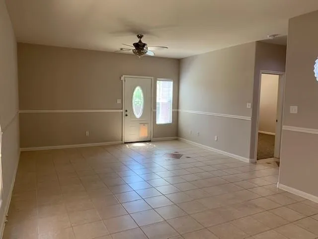 a view of a livingroom with a staircase