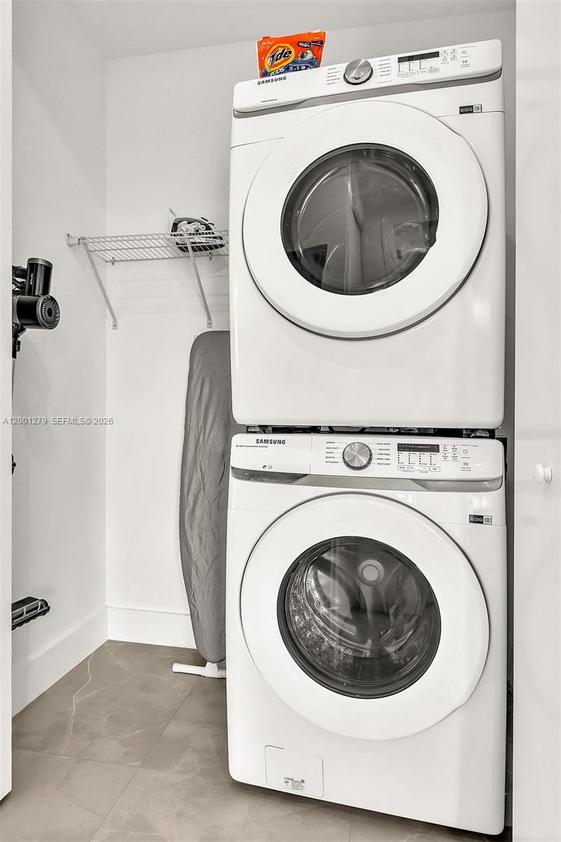 2100 Miami Road, Unit 403 Fort Lauderdale, FL 33316 - Photo 34 of 44 a utility room with dryer and washer