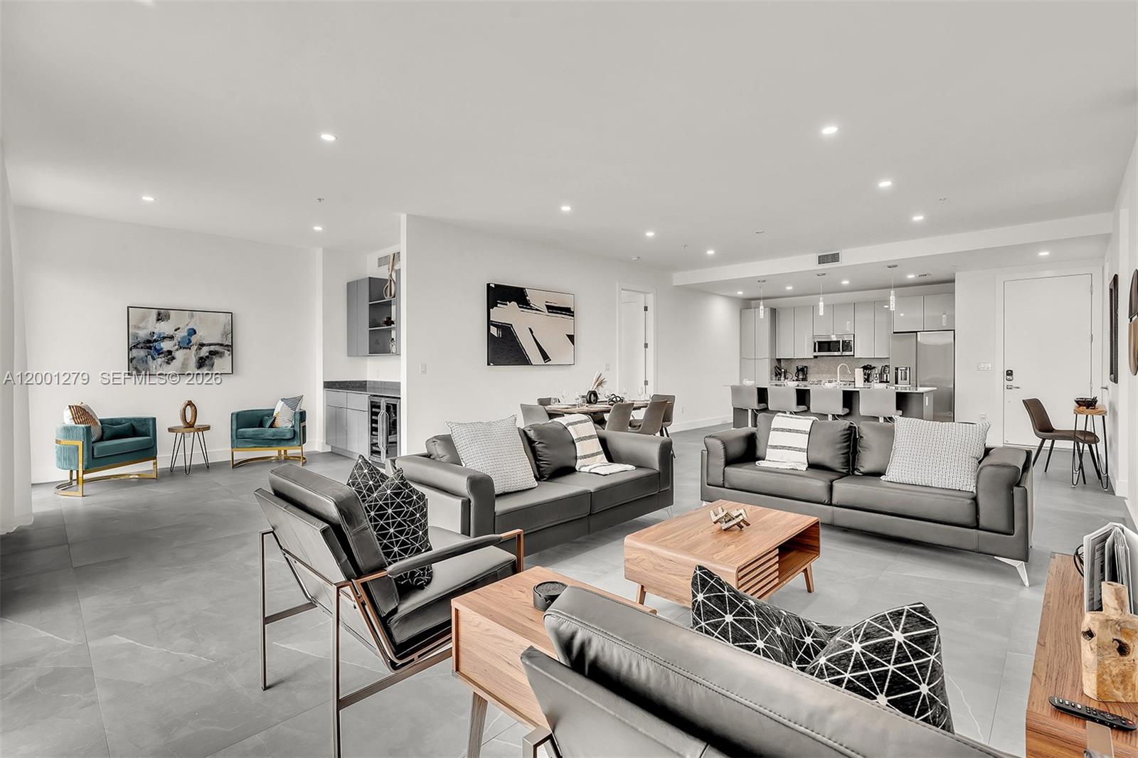 2100 Miami Road, Unit 403 Fort Lauderdale, FL 33316 - Photo 4 of 44 a living room with furniture or couch and a kitchen