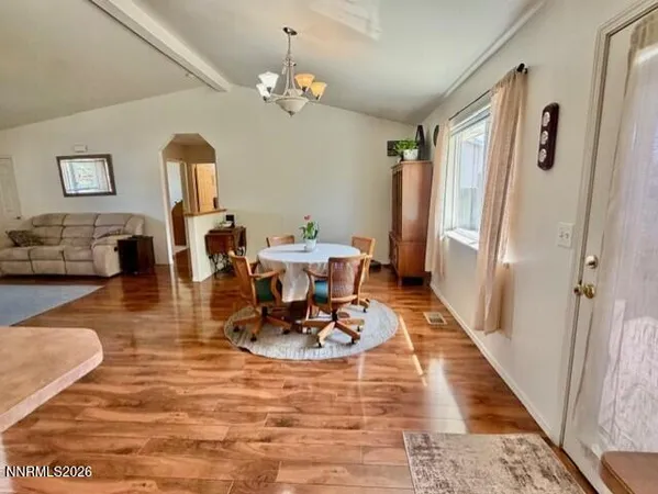 a view of a dining room with furniture