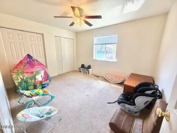 a living room with furniture and a couch