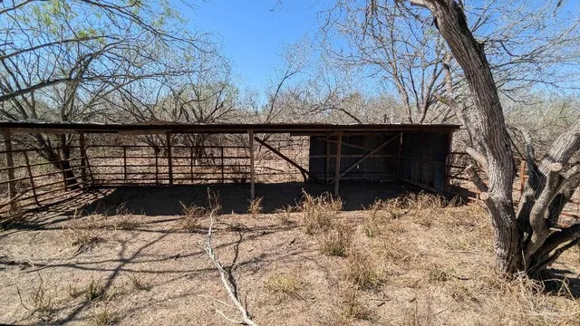 a view of outdoor space and wooden deck