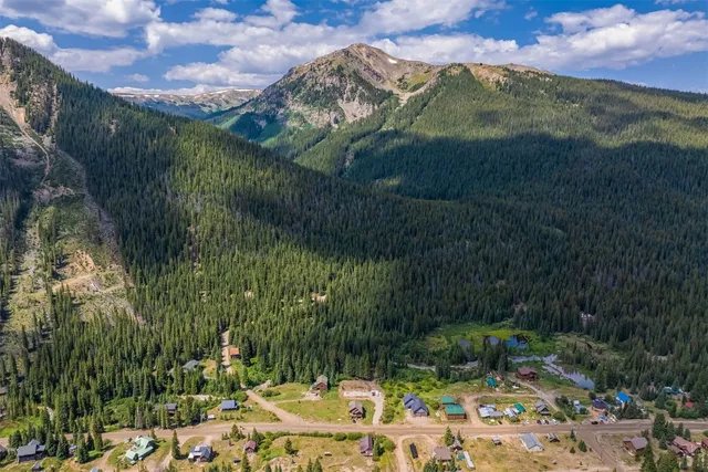 a view of a garden with a pond