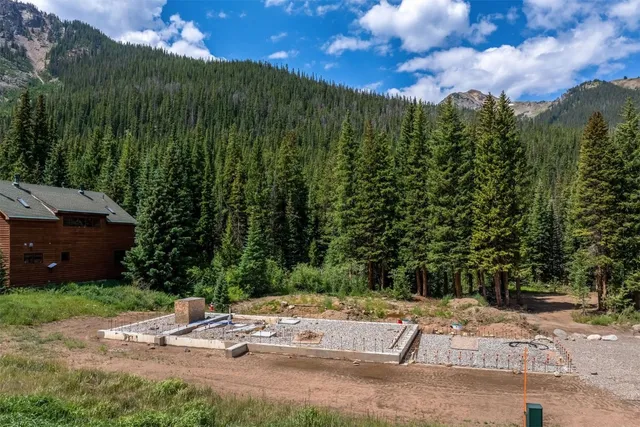 a view of a street with a building in the background