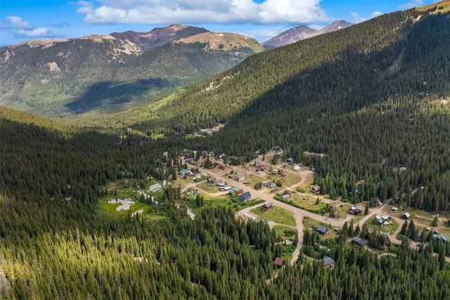 a view of backyard with green space