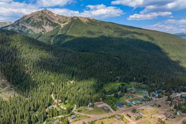 a view of a house with a mountain
