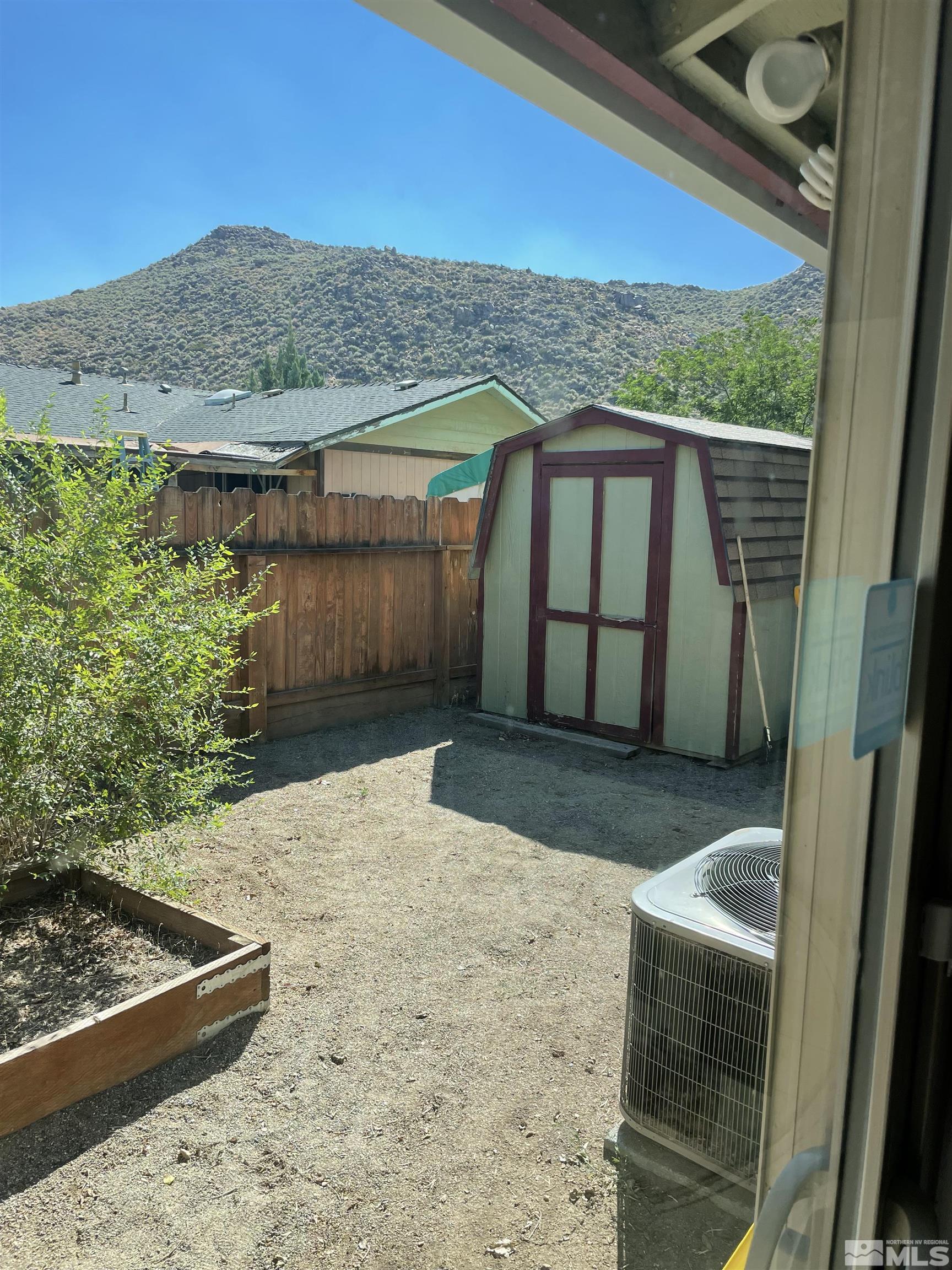 9525 Fremont Way Reno, NV 89506 - Photo 22 of 23 a view of a backyard