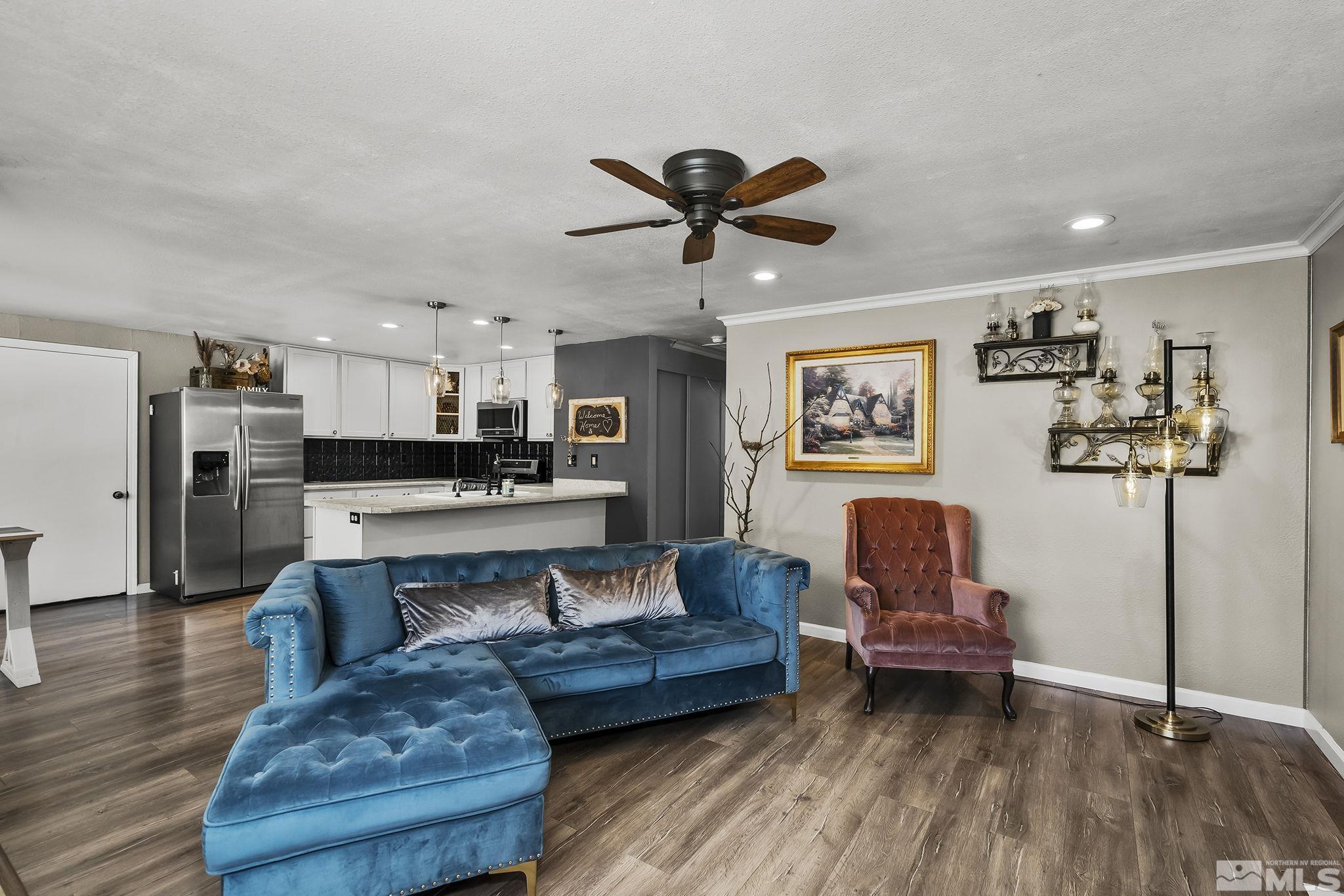 9525 Fremont Way Reno, NV 89506 - Photo 7 of 23 a living room with furniture and kitchen view