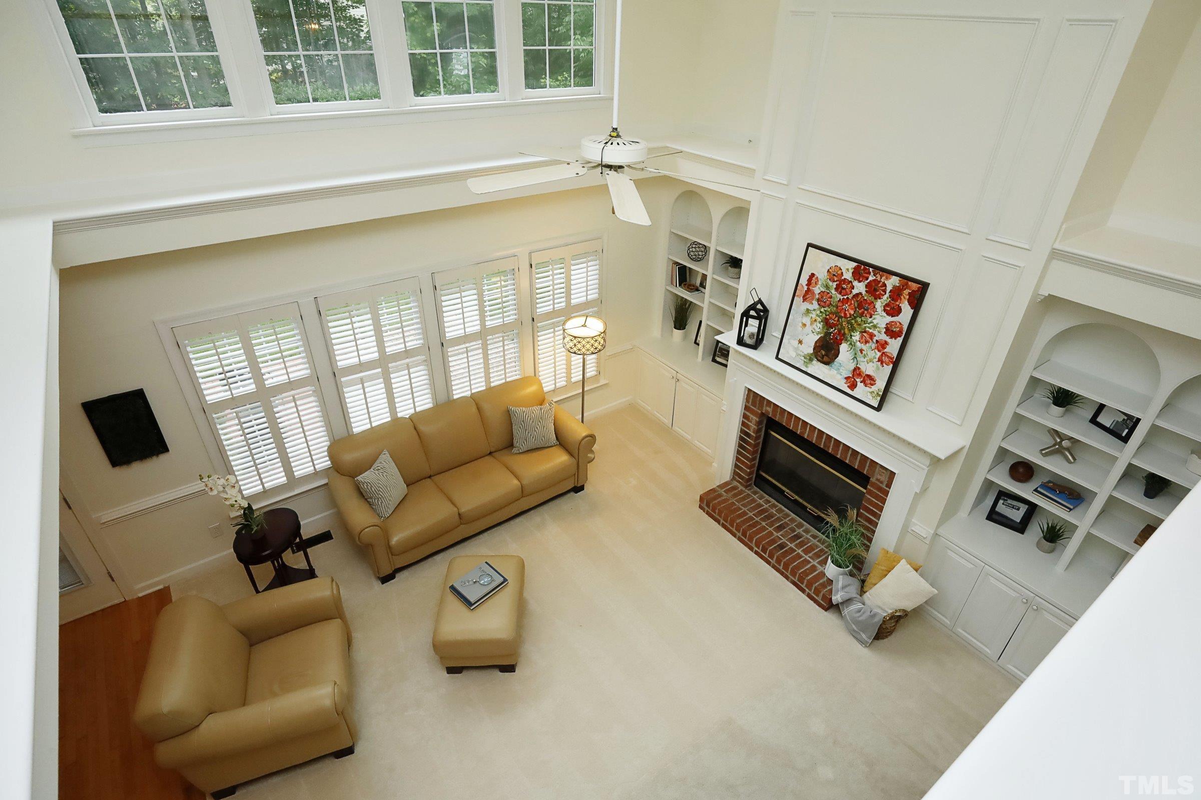 101 Modena Drive Cary, NC 27513 - Photo 17 of 57 a living room with furniture and a window