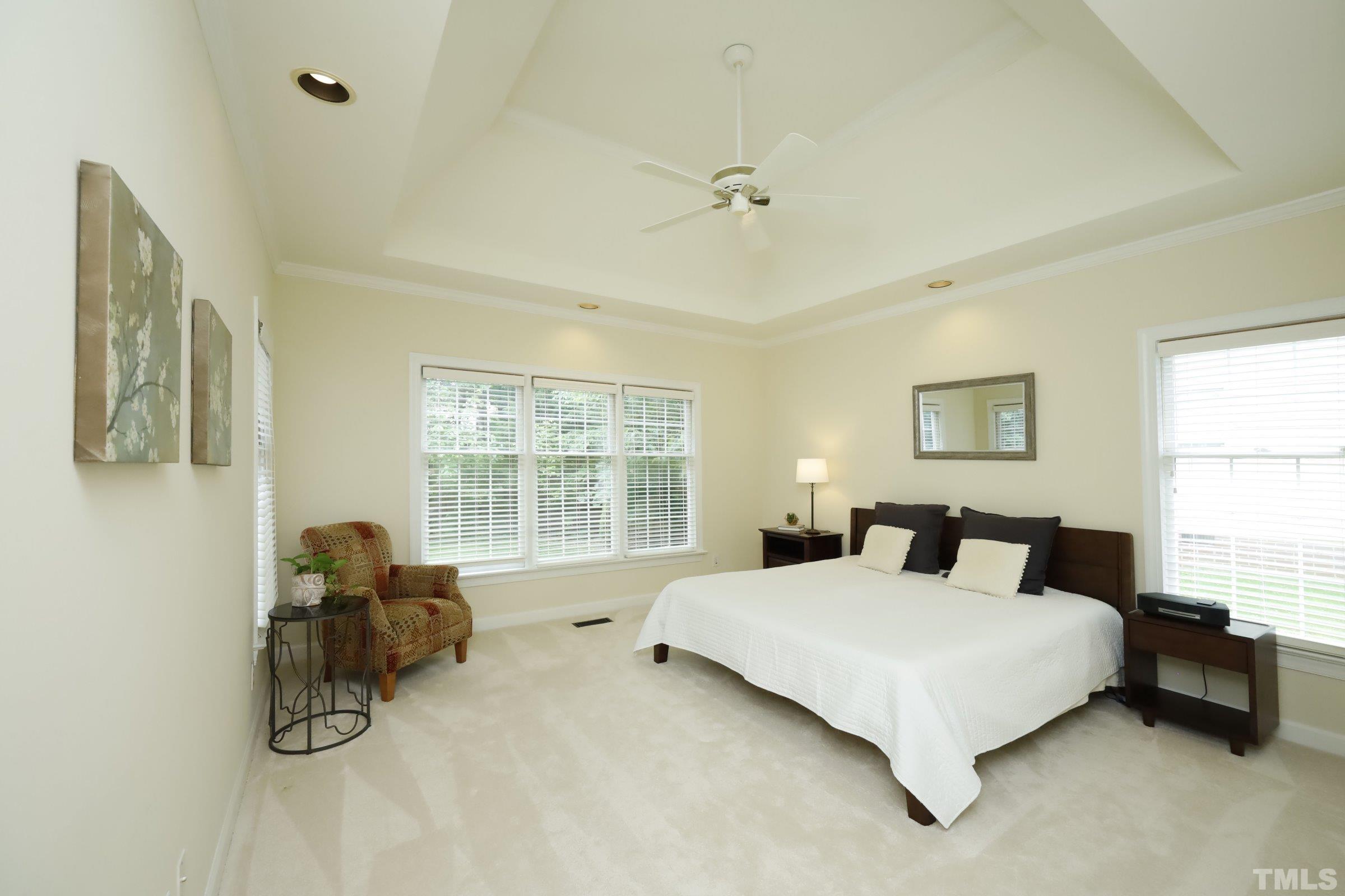 101 Modena Drive Cary, NC 27513 - Photo 30 of 57 a bedroom with bed and window