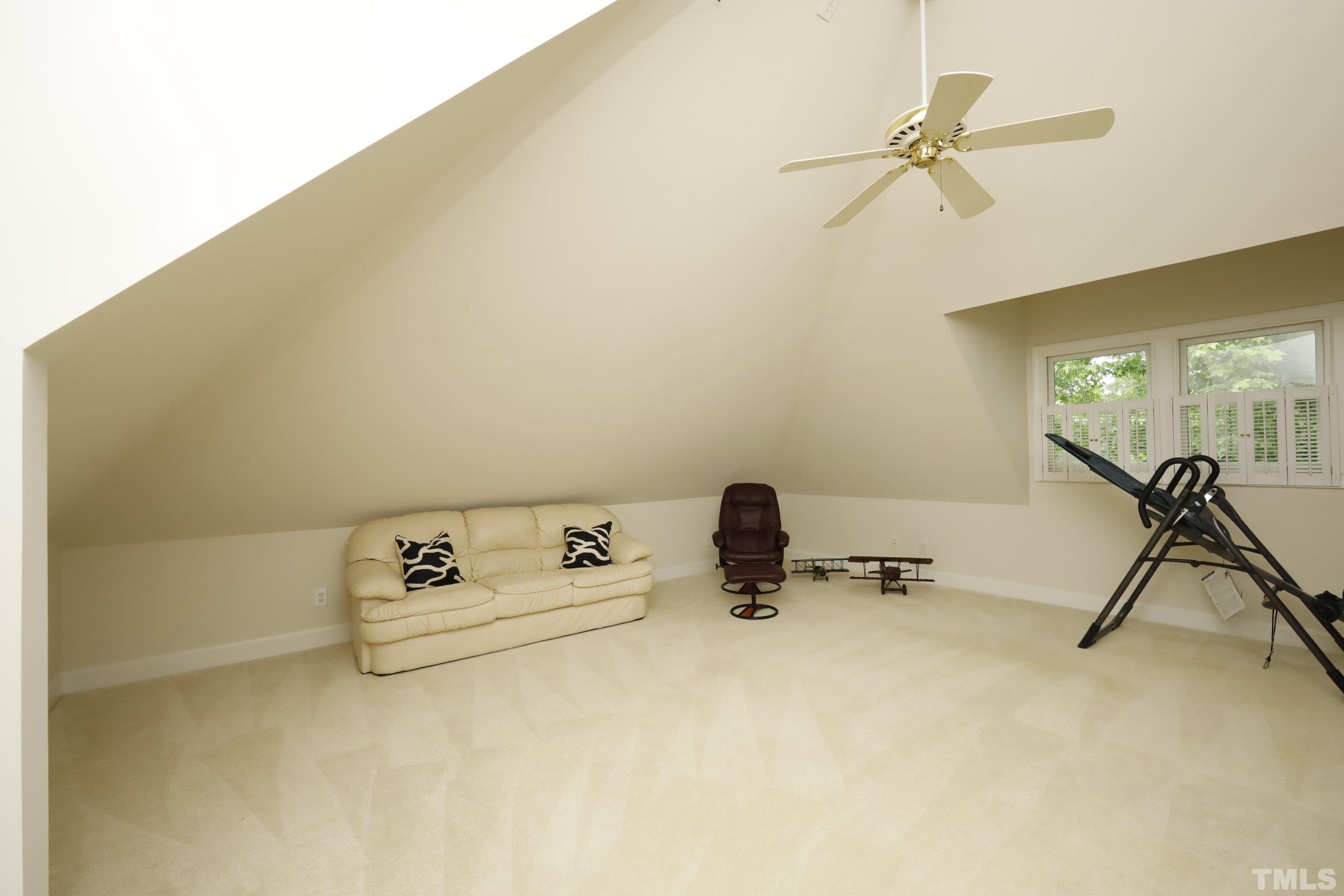 101 Modena Drive Cary, NC 27513 - Photo 33 of 57 a view of a room with gym equipment