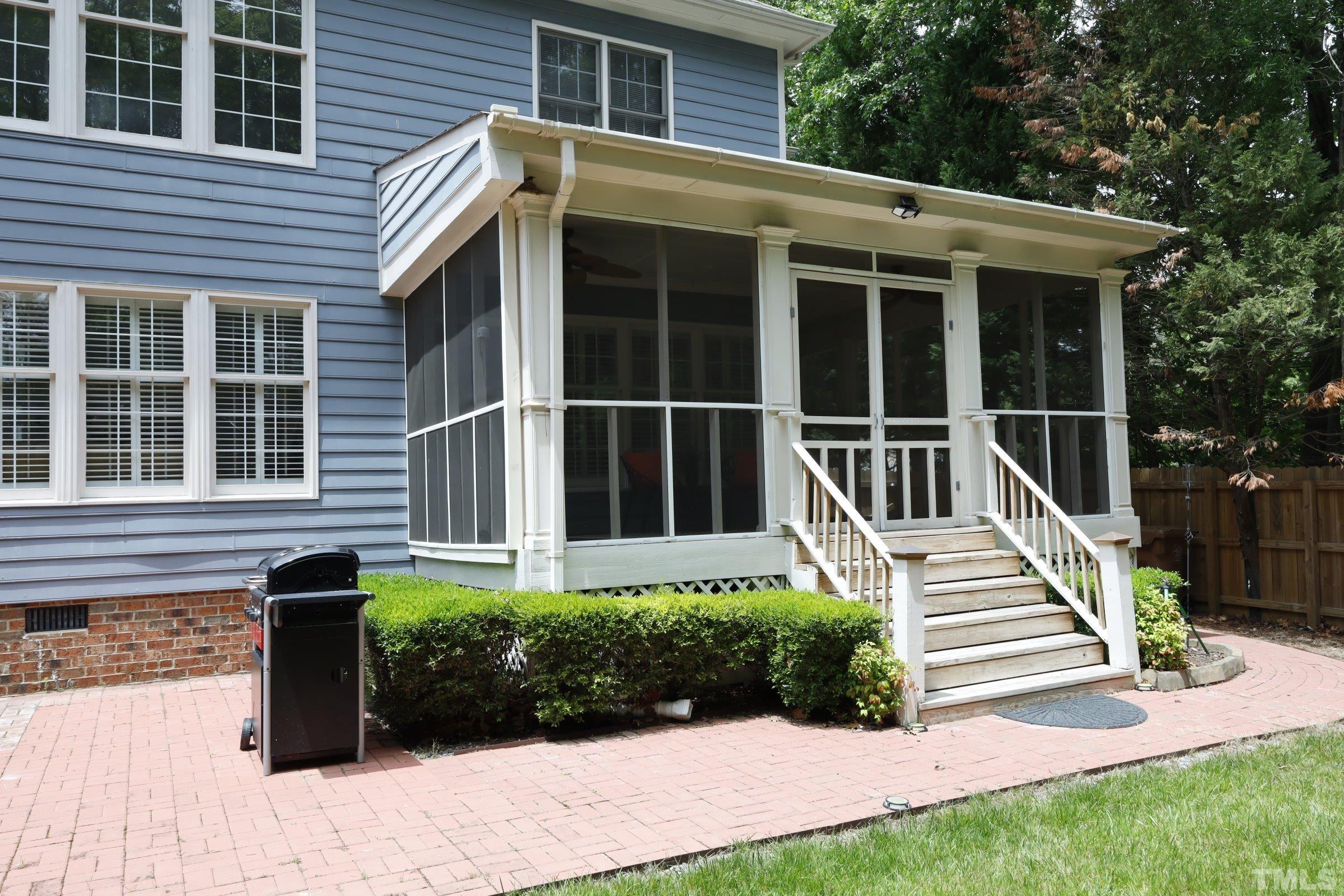 101 Modena Drive Cary, NC 27513 - Photo 53 of 57 a front view of a house with a yard