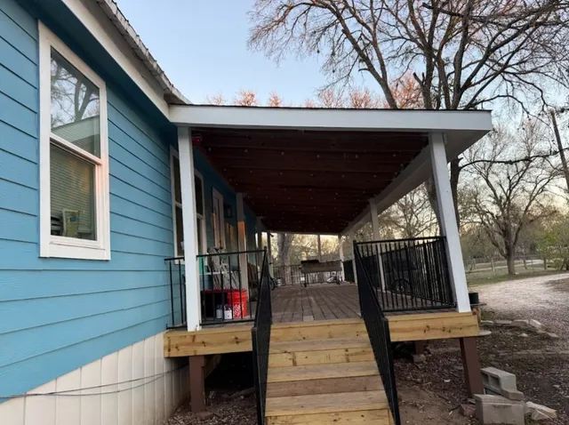 a backyard of a house with seating space