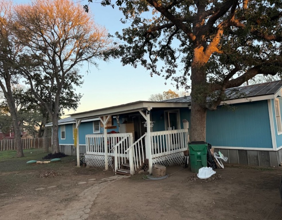 176 Pearson Road Dale, TX 78616 - Photo 19 of 39 a view of a chair and table in the back yard of the house