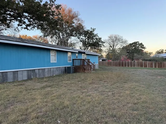 a house view with a garden space