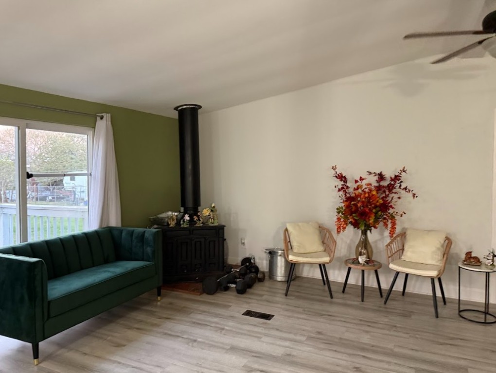 176 Pearson Road Dale, TX 78616 - Photo 26 of 39 a living room with furniture and wooden floor