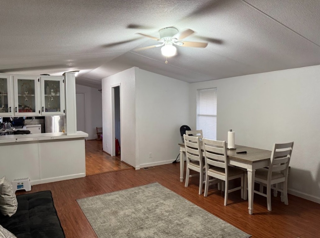 176 Pearson Road Dale, TX 78616 - Photo 39 of 39 a view of a dining room with furniture and wooden floor
