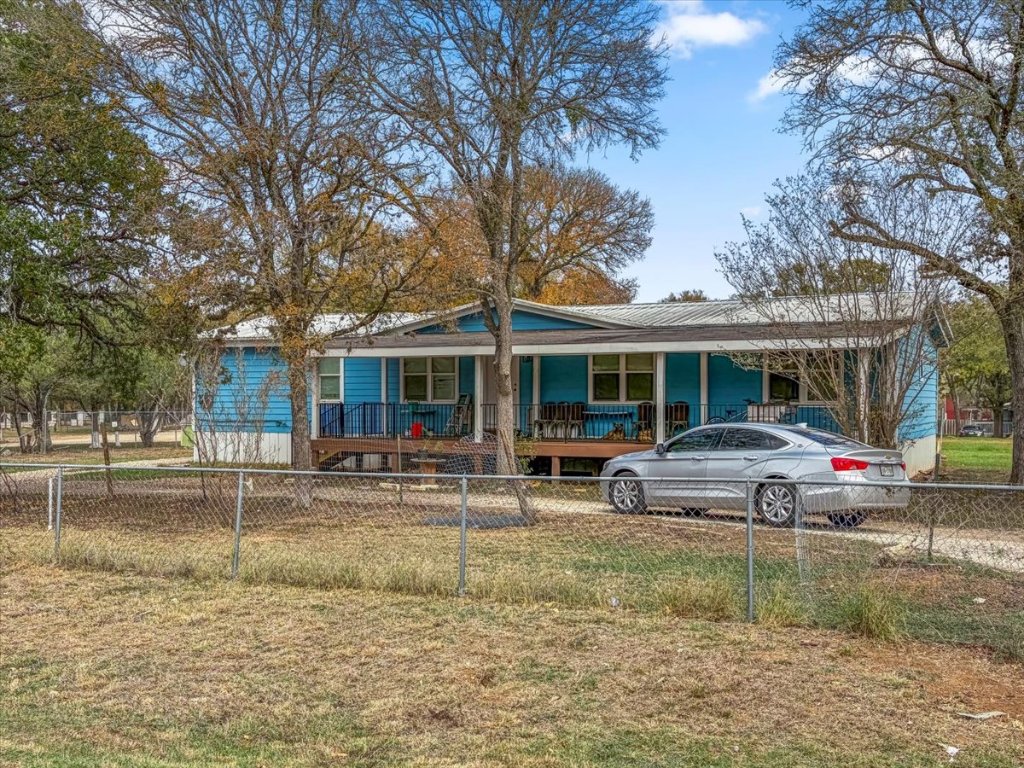 176 Pearson Road Dale, TX 78616 - Photo 6 of 39 a view of a house with a yard and porch