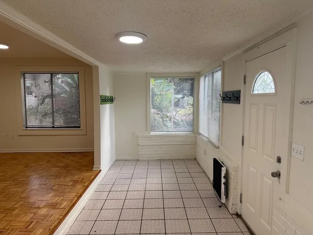 a view of empty room with windows