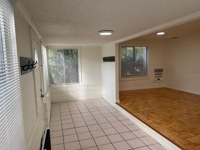 a view of an empty room and window