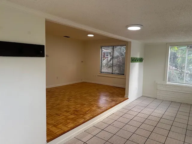 a view of an empty room and window