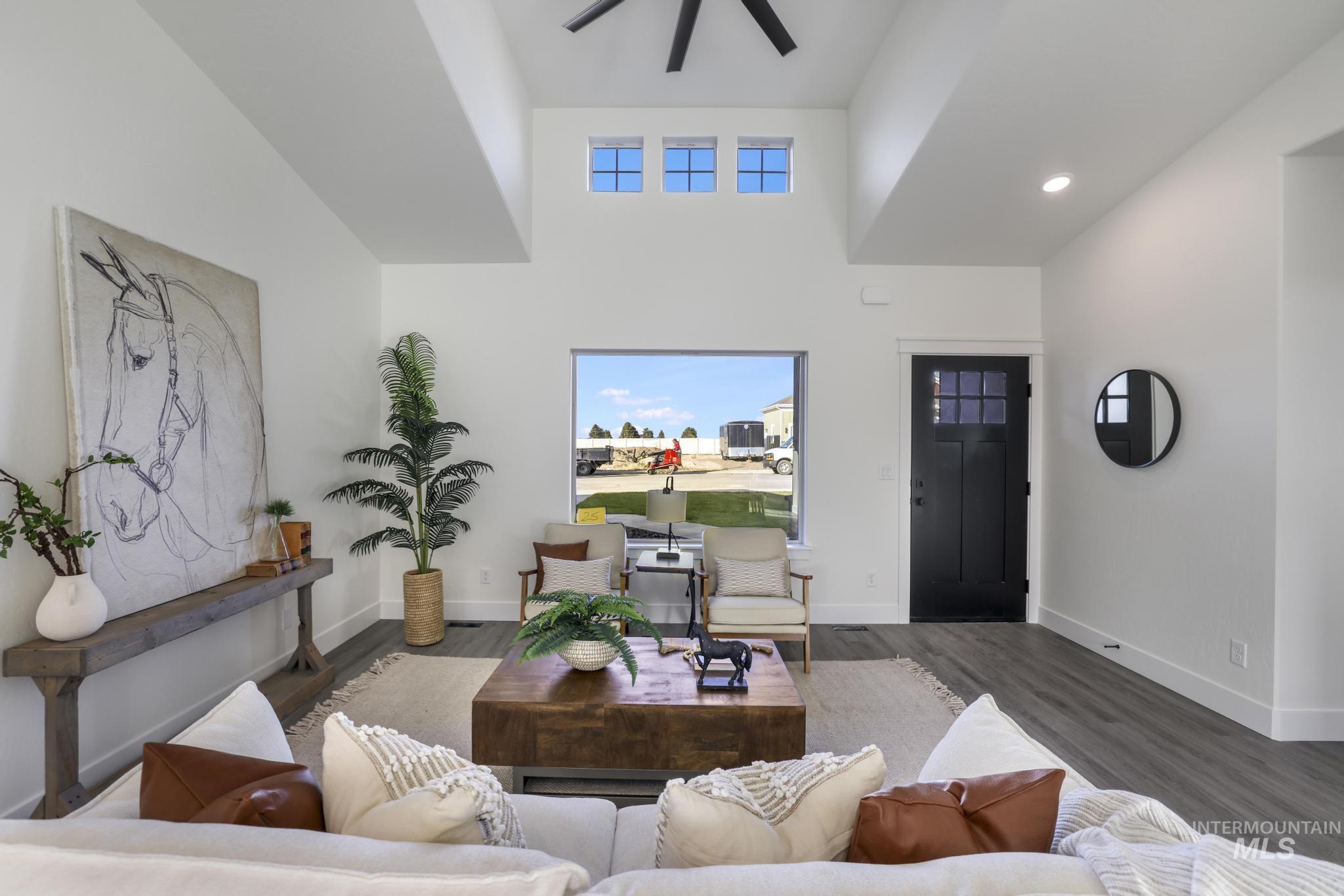 921 Adamite Road Kimberly, ID 83341 - Photo 8 of 25 Living room featuring a high ceiling, wood finished floors, recessed lighting, and ceiling fan