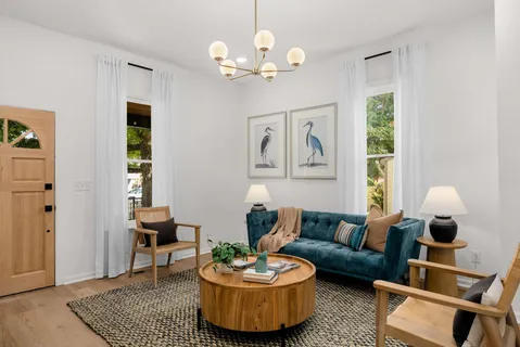 a living room with furniture and a window